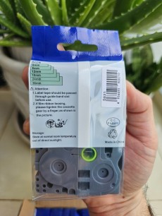 Nhãn in siêu dính TZ2-S631 ( Nhãn in 12mm Siêu Dính- Chữ đen nền vàng - Dài 8 met )