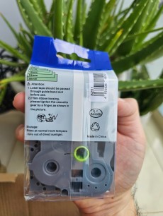 Nhãn in TZ2-S261 (Nhãn in 36mm Siêu Dính- Chữ đen trên nền trắng - Dài 8 met )